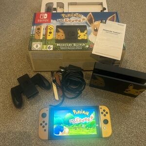 Nintendo Switch Pokémon Edition - Yellow and Black